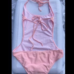 One piece open sides pink swimsuit